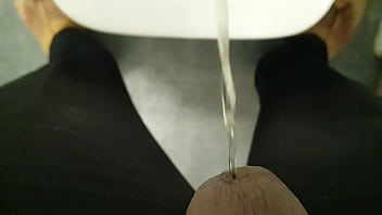 A Throbbing Indian Cock Unleashing A Hot Golden Stream