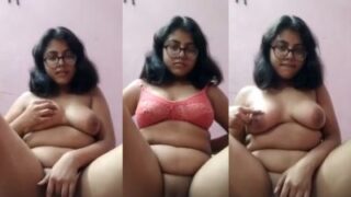 Busty Bespectacled Babe Gropes Her Heavy Tits And Teases Her Tight Slit