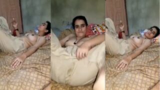 Sultry Punjabi Temptress Bares Her Curves While Indulging In A Smoky Tease